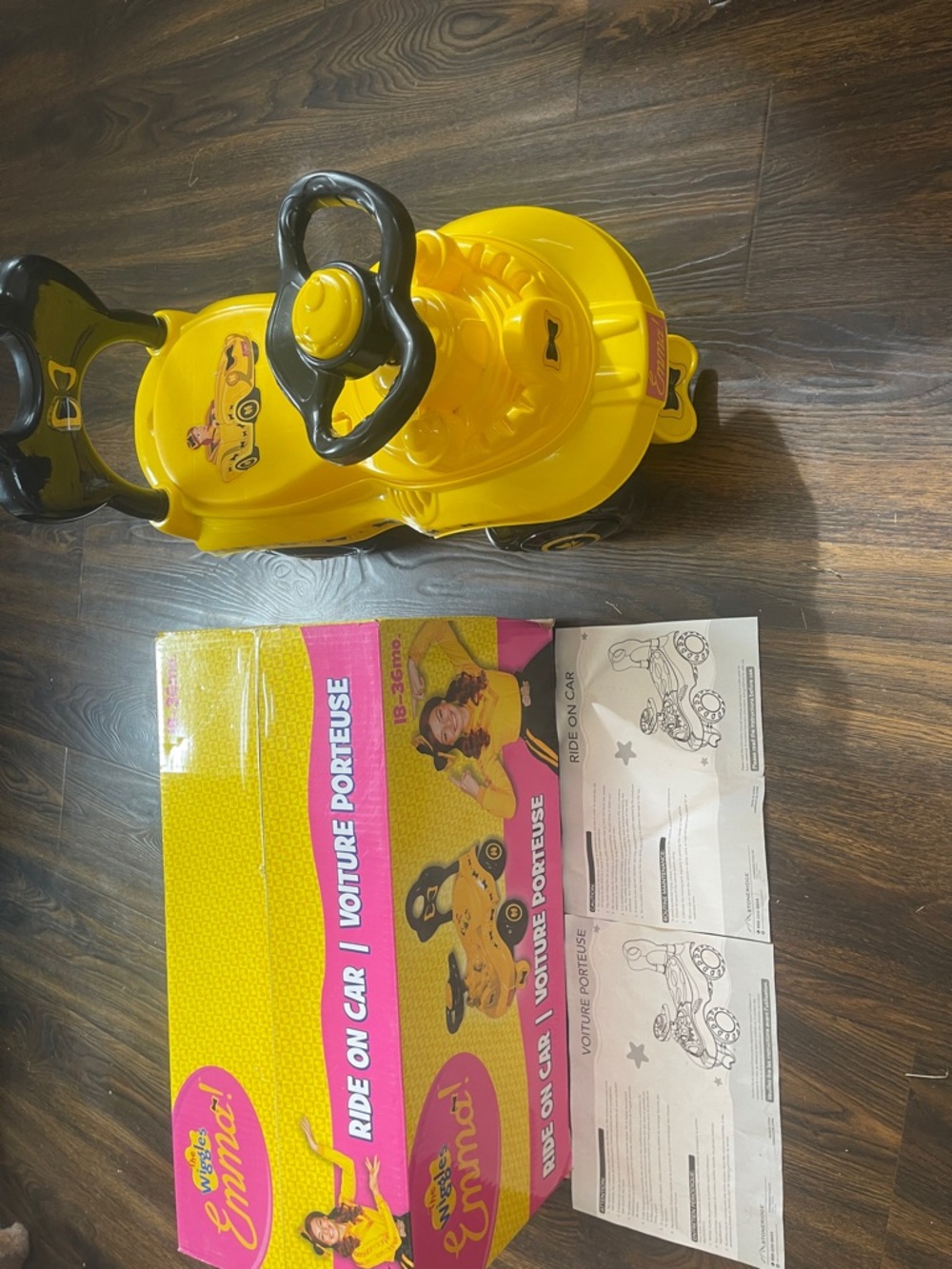 Yellow Ride-On Toy Car with Black Steering Wheel